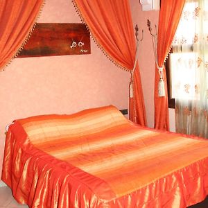 Kamer met een Queen Size Bed